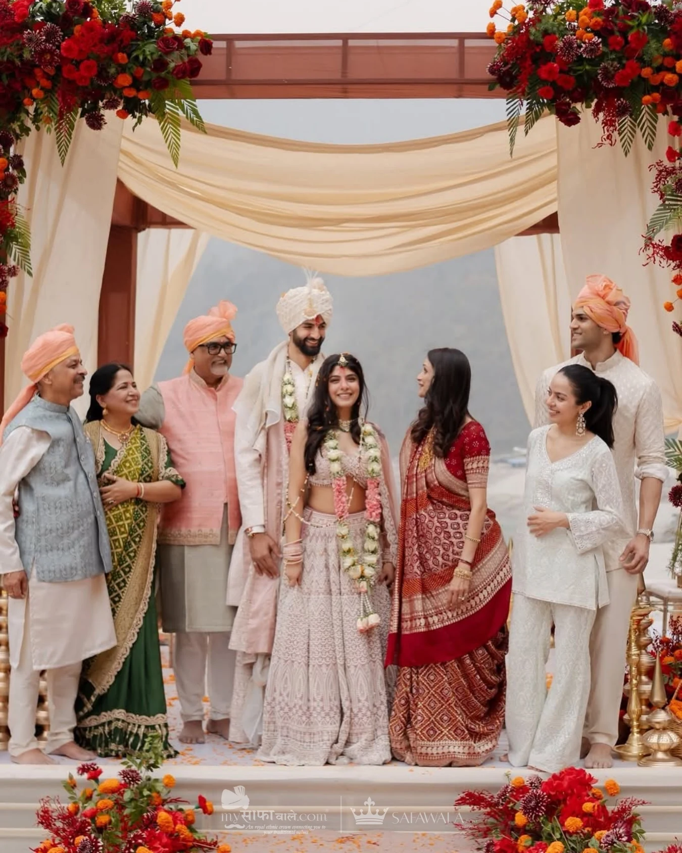 Royal red wedding safa and embroidered groom styling